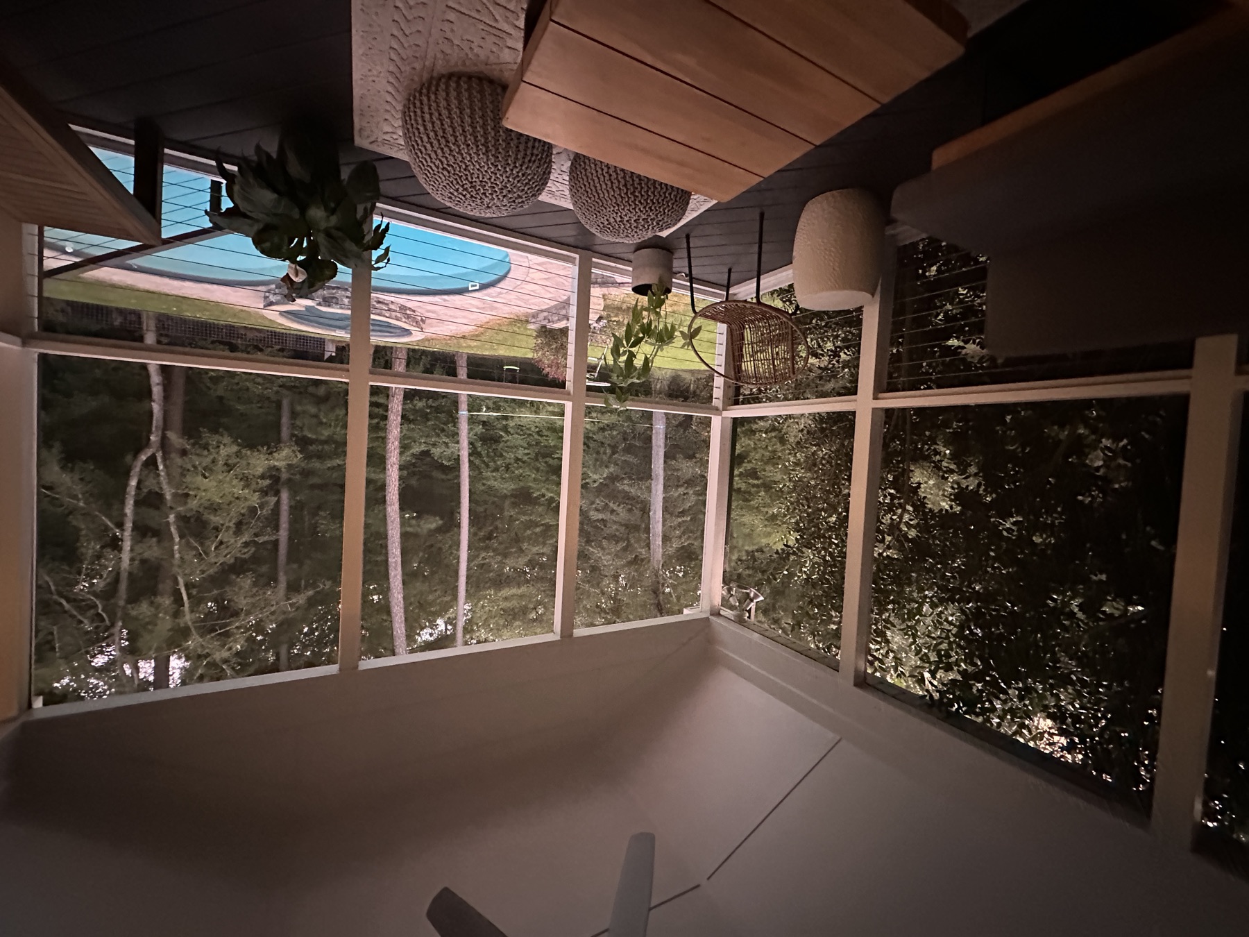 Screened porch overlooking pool